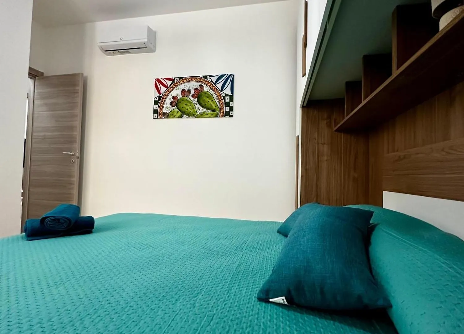 Domus Apartament 카포오를란도 펜션