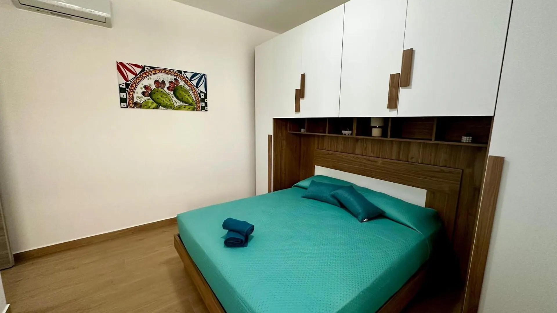 Domus Apartament 카포오를란도 펜션